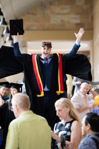 Tobias Street celebrates at graduation 