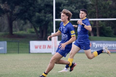 Hunter Robinson playing rugby 